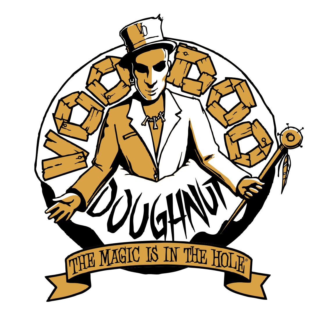 voodoo doughnut logo in gold, black, and white with a baron inside of a doughnut shape and a banner on bottom that says "the magic is in the hole"